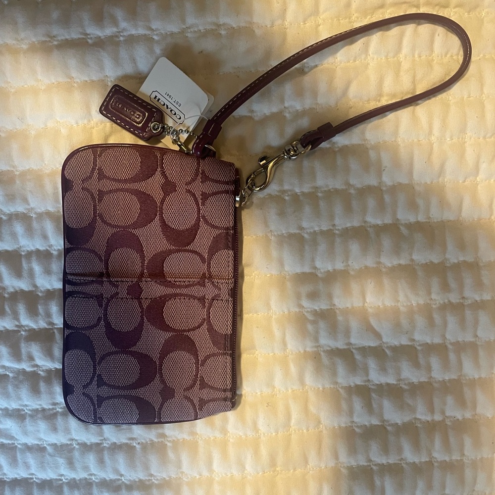 Coach Plum Signature Wristlet